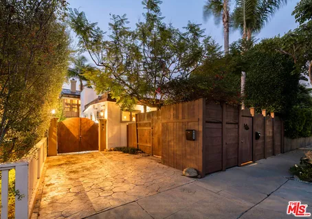 a view of a house with a tree
