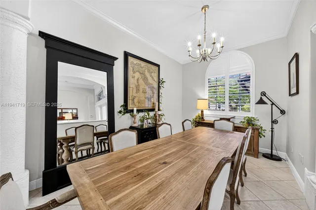 a kitchen with stainless steel appliances a sink and a refrigerator