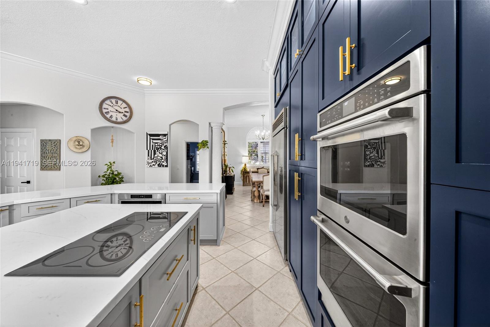 12530 Southwest 96th Court Miami, FL 33176 - Photo 21 of 82 a kitchen with cabinets and stainless steel appliances