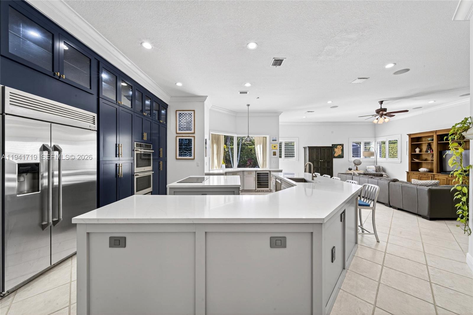 12530 Southwest 96th Court Miami, FL 33176 - Photo 23 of 82 a kitchen with stainless steel appliances a sink and a refrigerator
