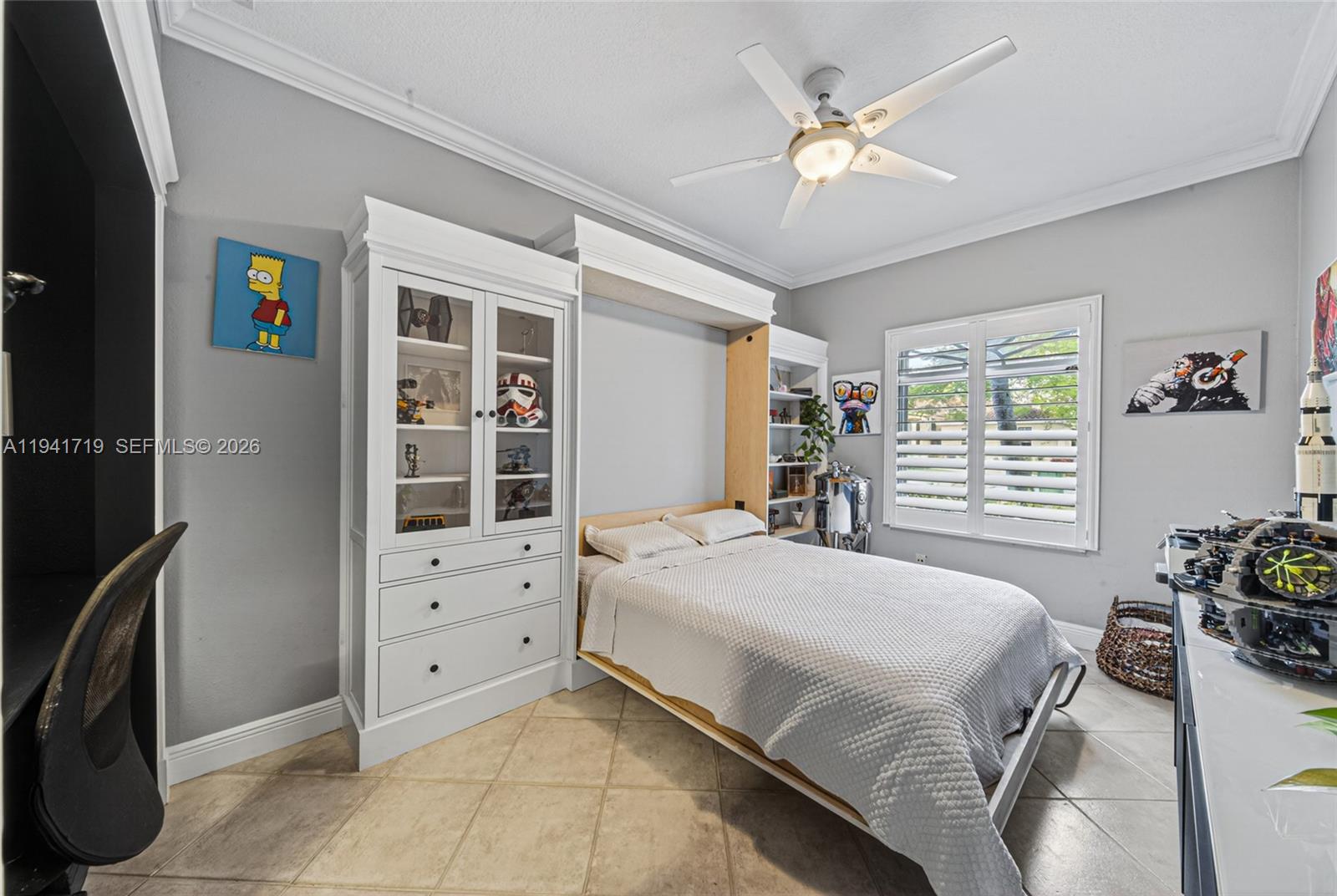 12530 Southwest 96th Court Miami, FL 33176 - Photo 31 of 82 a bedroom with a bed and a window