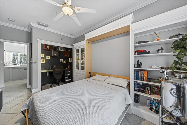 a bedroom with a bed and a walk in closet