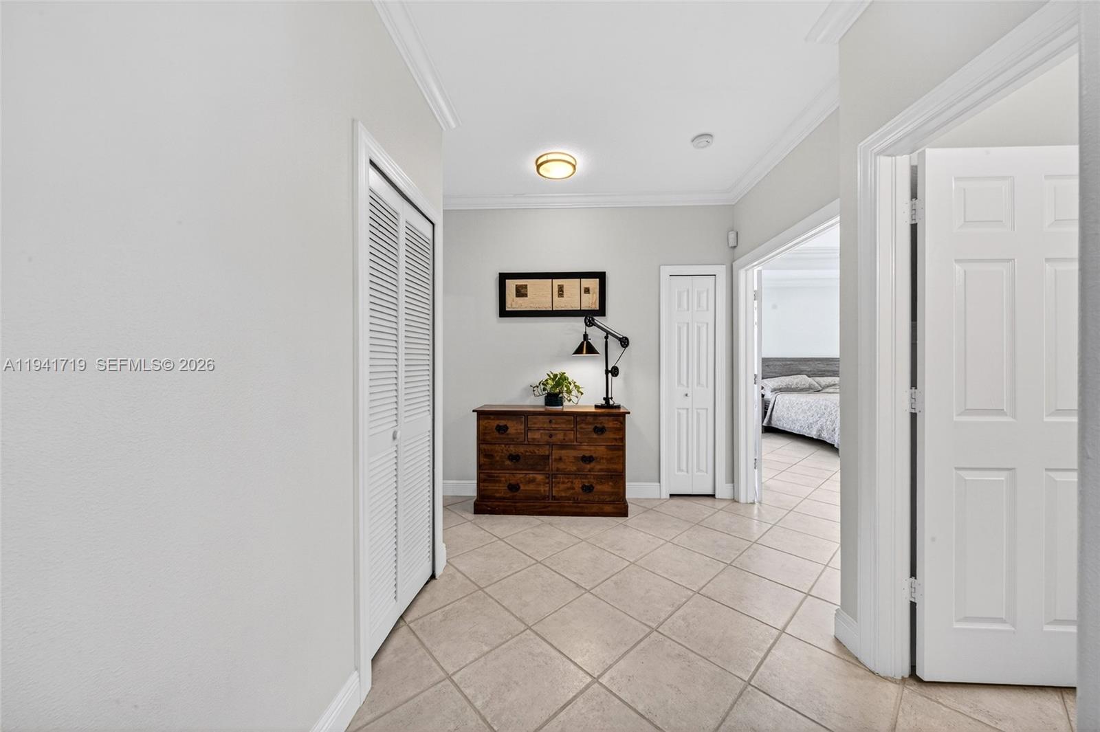 12530 Southwest 96th Court Miami, FL 33176 - Photo 35 of 82 a view of a hallway view with staircase