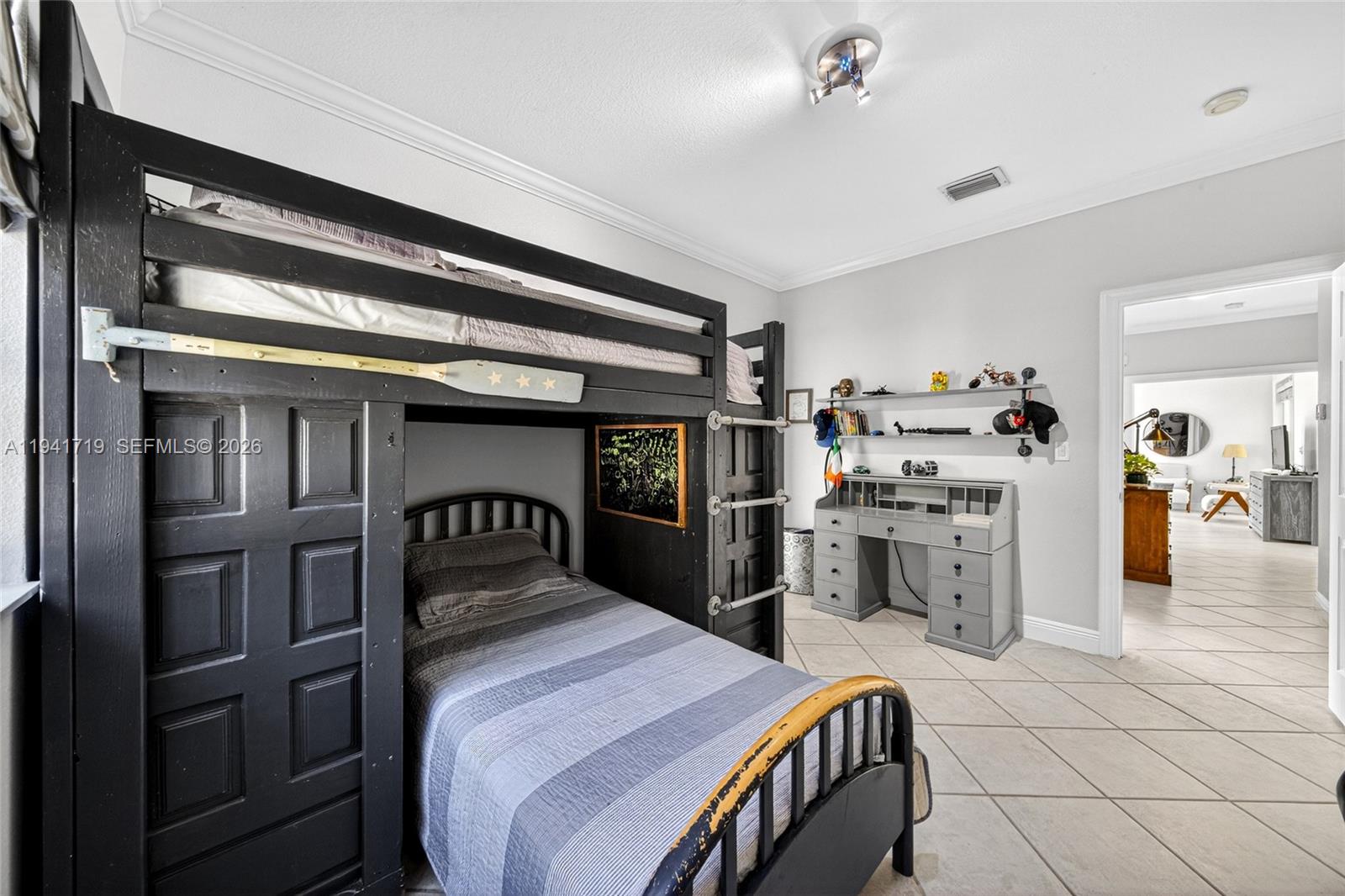 12530 Southwest 96th Court Miami, FL 33176 - Photo 45 of 82 a bedroom with a bed and a view of kitchen