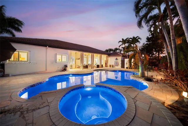a picture of a bathroom with a shower