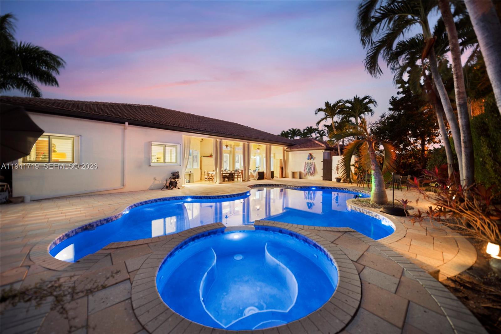 12530 Southwest 96th Court Miami, FL 33176 - Photo 58 of 82 a view of a living room and dining room