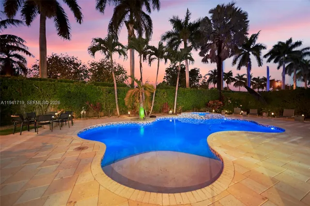 an aerial view of houses with yard
