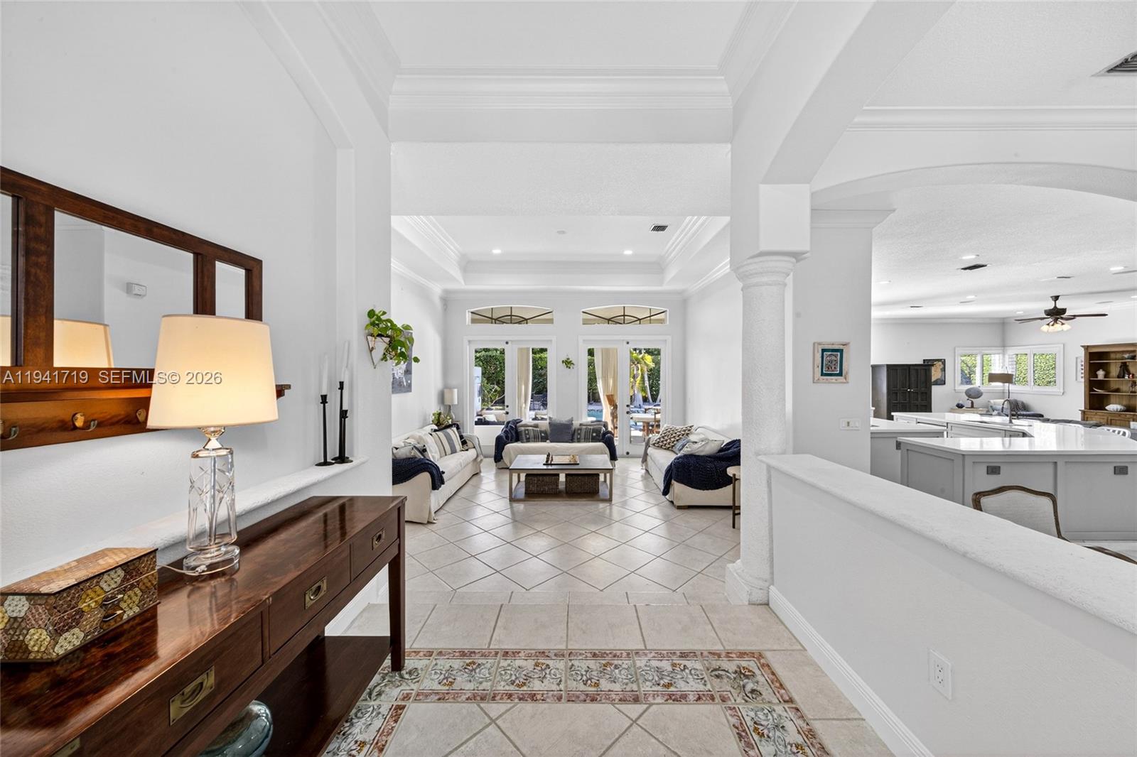 12530 Southwest 96th Court Miami, FL 33176 - Photo 10 of 82 a living room with furniture a rug and a large window