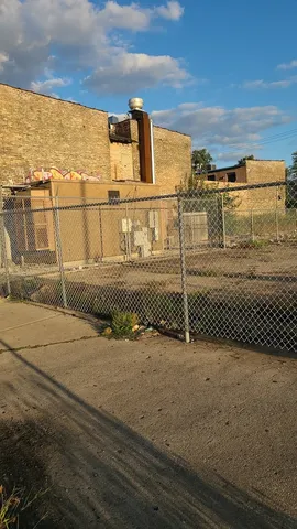 a kitchen with stainless steel appliances granite countertop a refrigerator stove a sink and dishwasher