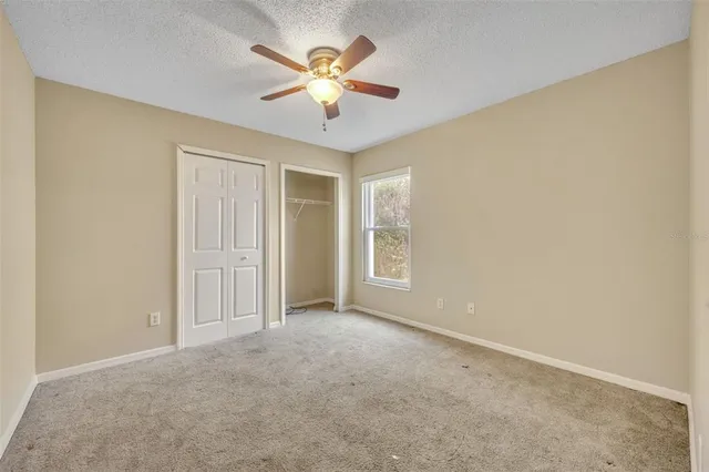 a bathroom with a sink toilet tub and shower