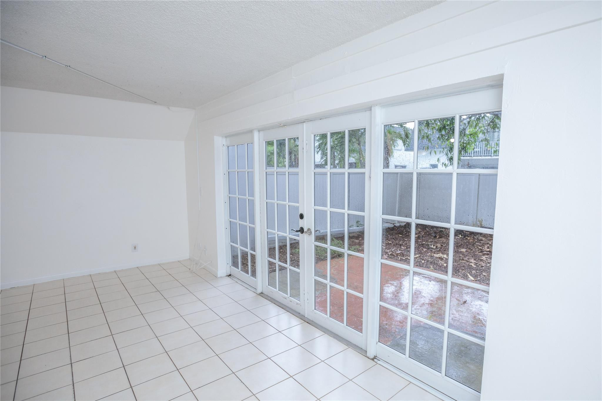 6764 Southwest 40th Street, Unit 40 Davie, FL 33314 - Photo 5 of 17 a view of empty room with windows