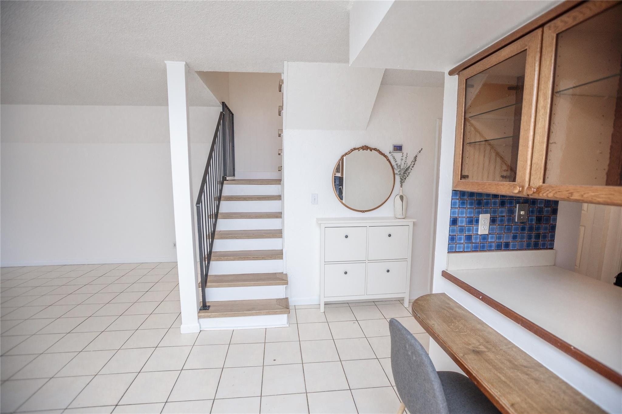 6764 Southwest 40th Street, Unit 40 Davie, FL 33314 - Photo 9 of 17 a view of a kitchen with cabinets and staircase