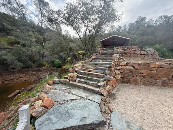 a view of a backyard of a house