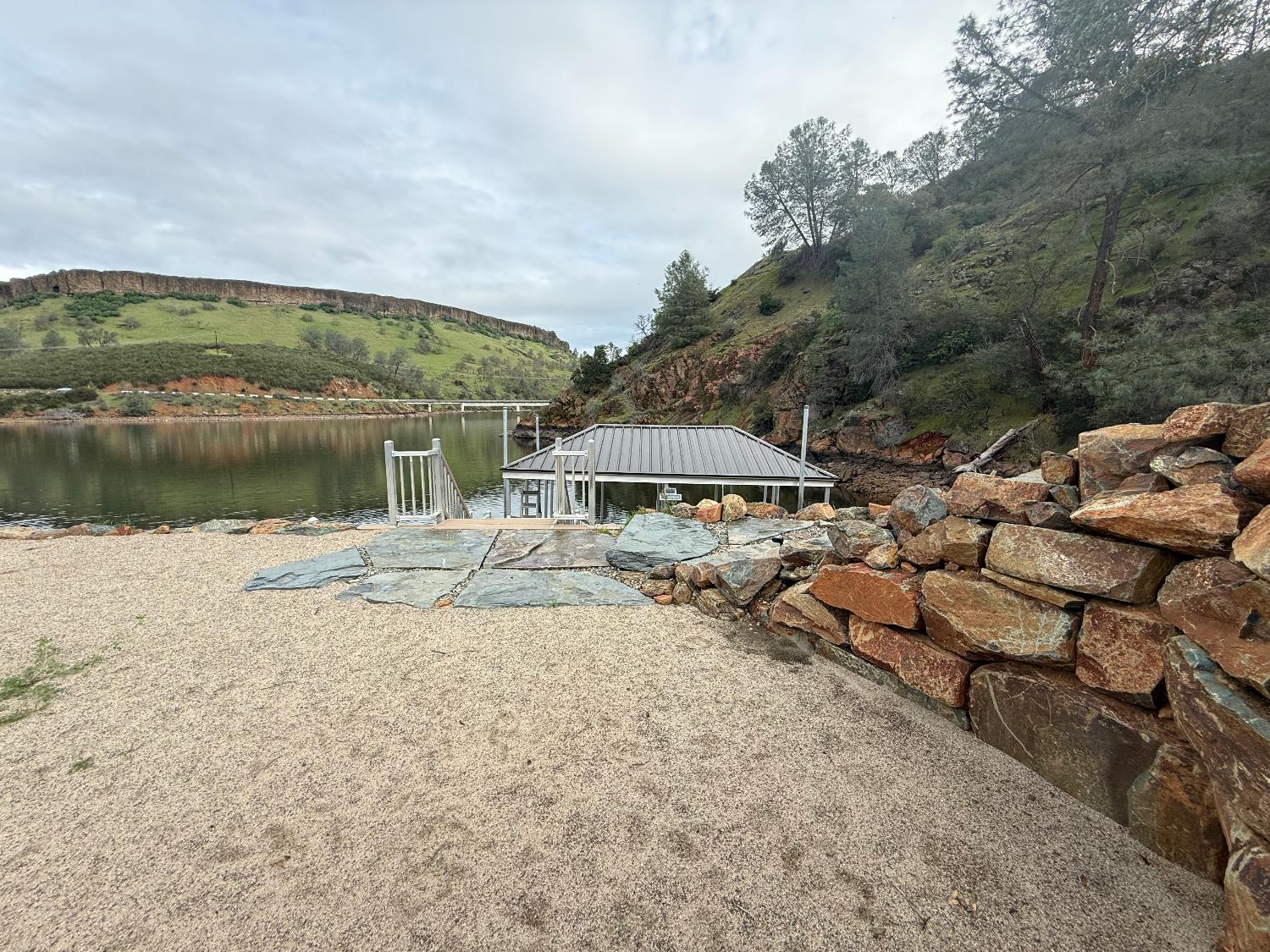 15000 Old O'Byrnes Ferry Road Jamestown, CA 95327 - Photo 18 of 62 a view of a lake with a house