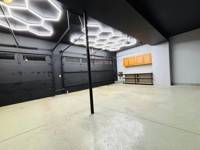 a view of cabinets and wooden floor