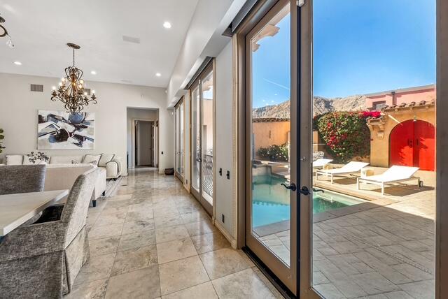 20 Vía Condotti Rancho Mirage, CA 92270 - Photo 18 of 40 a view of a living room and a balcony