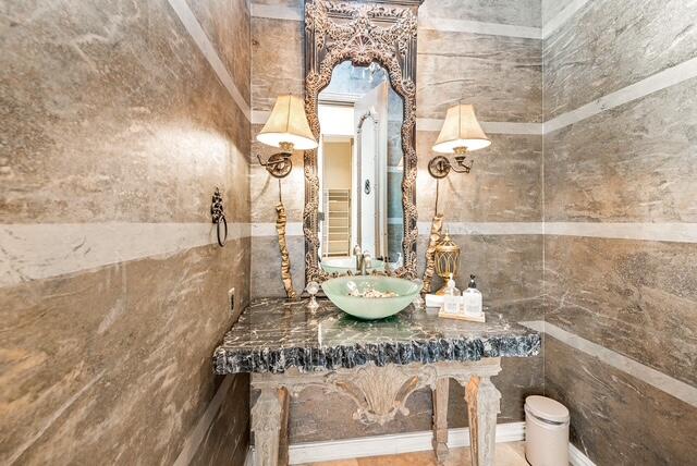 20 Vía Condotti Rancho Mirage, CA 92270 - Photo 20 of 40 a bathroom with a granite countertop sink and a mirror