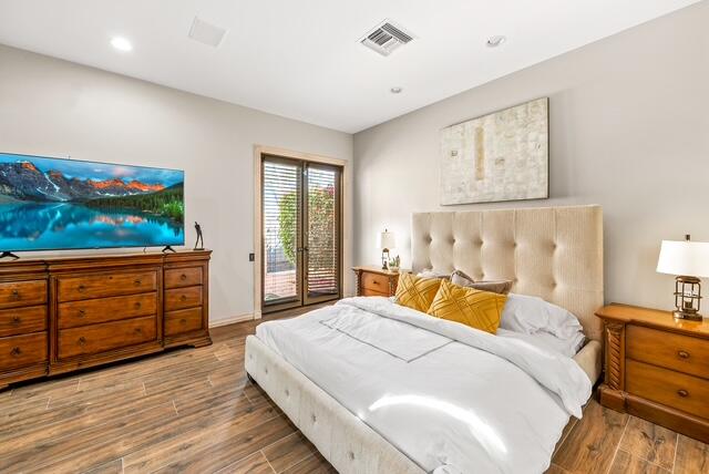 20 Vía Condotti Rancho Mirage, CA 92270 - Photo 23 of 40 a bedroom with a bed and a dresser