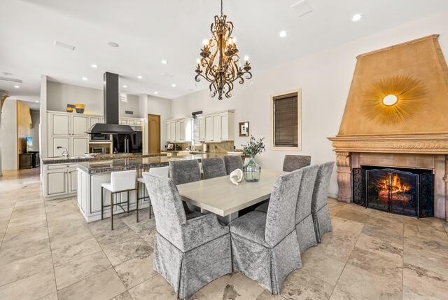 20 Vía Condotti Rancho Mirage, CA 92270 - Photo 3 of 40 a view of a dining room kitchen and a fireplace