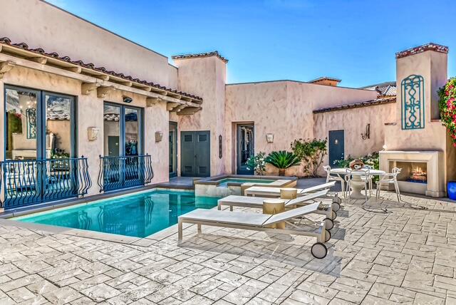 20 Vía Condotti Rancho Mirage, CA 92270 - Photo 40 of 40 a view of a house with backyard porch and glass windows