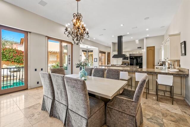 20 Vía Condotti Rancho Mirage, CA 92270 - Photo 4 of 40 a view of a dining room with furniture window and outside view