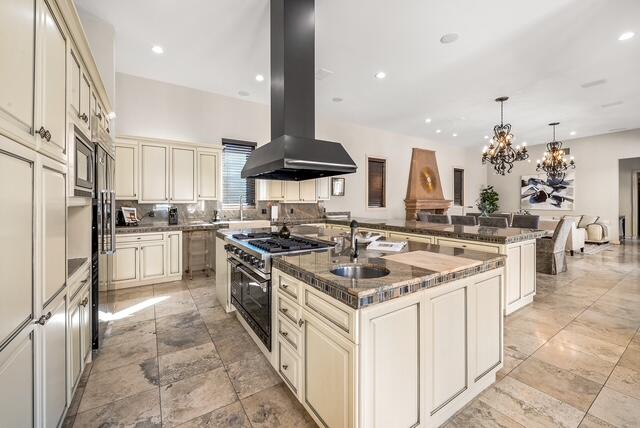20 Vía Condotti Rancho Mirage, CA 92270 - Photo 7 of 40 a kitchen with a sink stove and cabinets