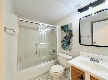 a view of a utility room with wooden floor