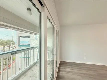 a room with a bed and a chair