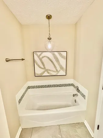 a bathroom with a bathtub