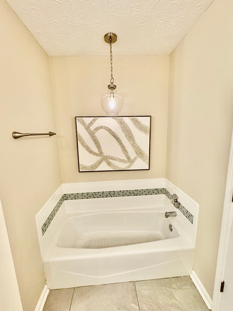 66 Ryan Loop Phenix City, AL 36869 - Photo 18 of 22 a bathroom with a bathtub