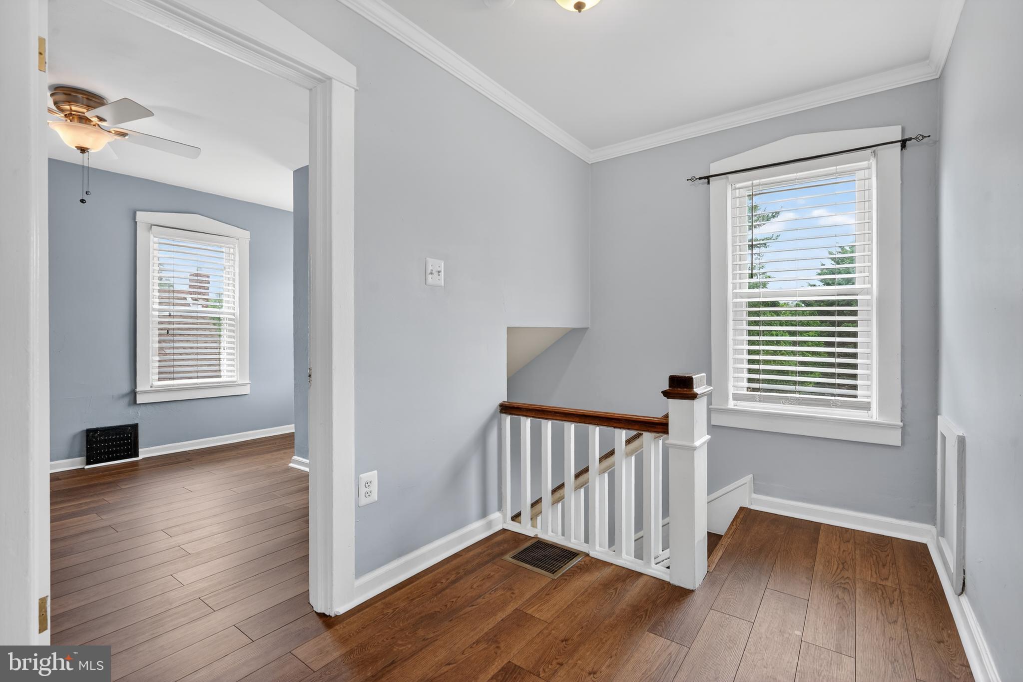 106 Ford Street Voorhees, NJ 08043 - Photo 18 of 36 a view of a room with wooden floor and windows