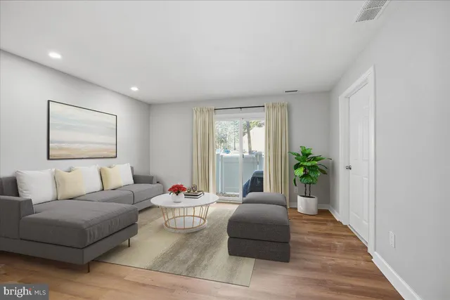 a kitchen with a sink stainless steel appliances and cabinets