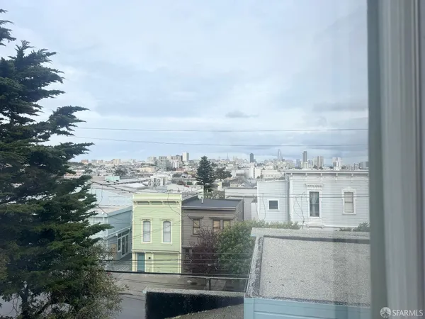 a view of a city with tall buildings