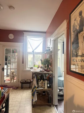 a room with furniture and a window