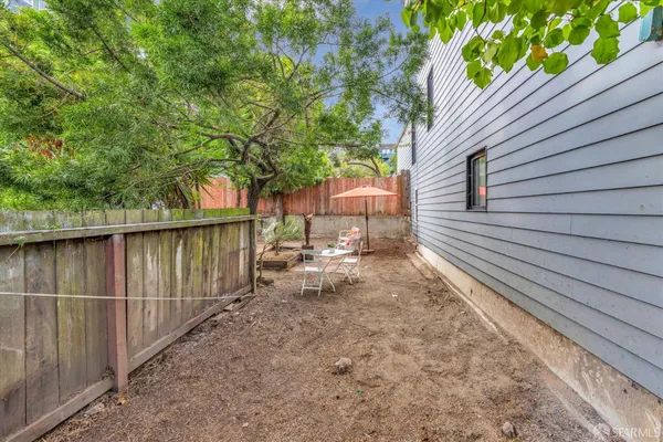 a view of backyard with trees