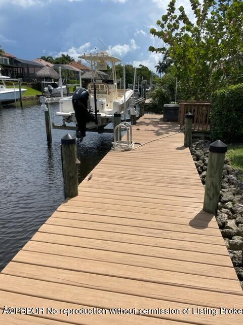 8774 Southeast Riverfront Terrace Tequesta, FL 33469 - Photo 17 of 45 a view of outdoor space with seating space
