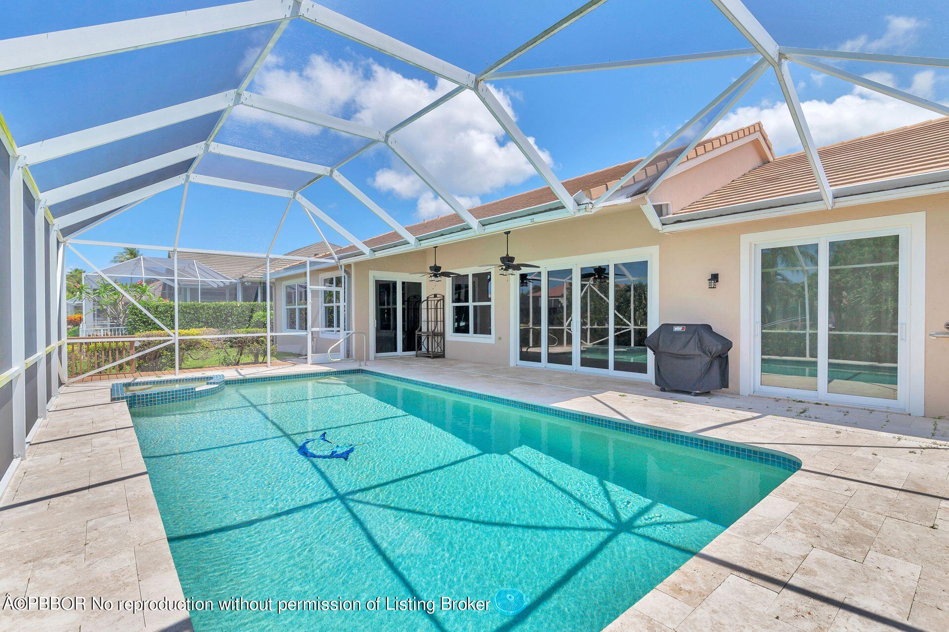 8774 Southeast Riverfront Terrace Tequesta, FL 33469 - Photo 32 of 45 a view of a house with backyard and porch