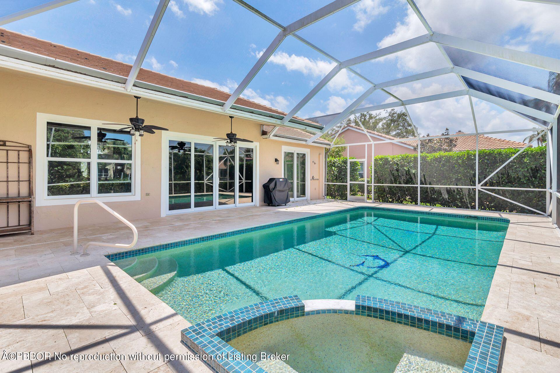 8774 Southeast Riverfront Terrace Tequesta, FL 33469 - Photo 33 of 45 a view of a patio with a table and chairs