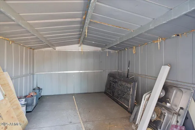 a view of a swimming pool with a lounge chairs