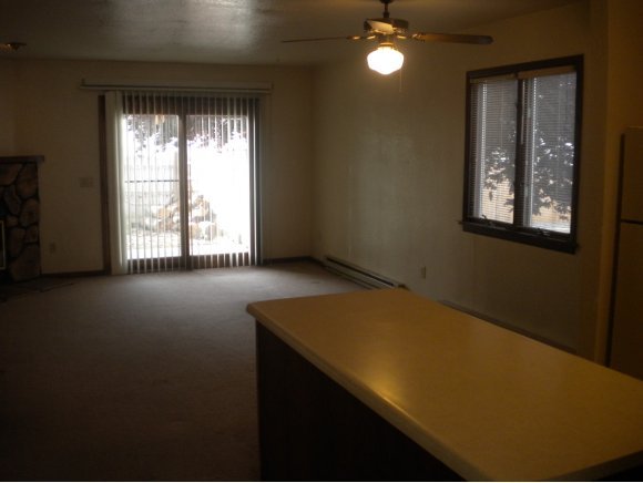 1222 Stetson Road, Unit 6 Prescott, AZ 86303 - Photo 3 of 6 a view of an empty room with a window