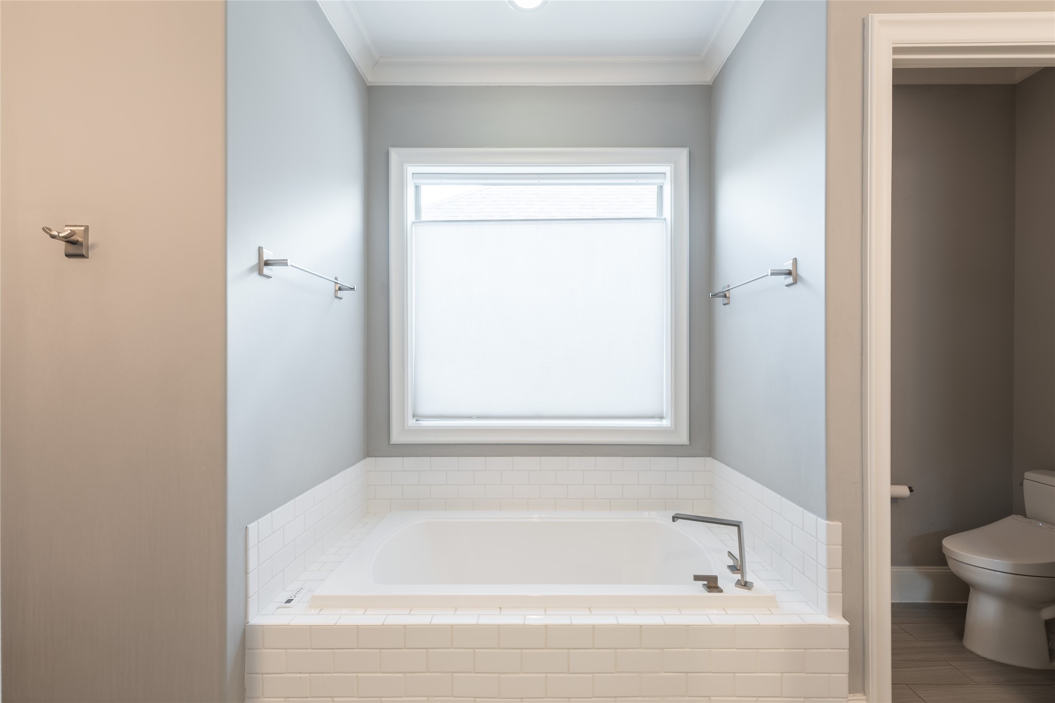 1944 Portsmouth Street Houston, TX 77098 - Photo 18 of 36 a white bath tub sitting next to a white toilet