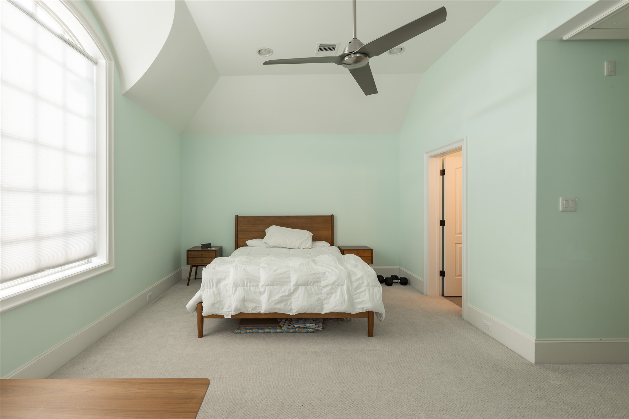 1944 Portsmouth Street Houston, TX 77098 - Photo 28 of 36 a bedroom with a bed and a window