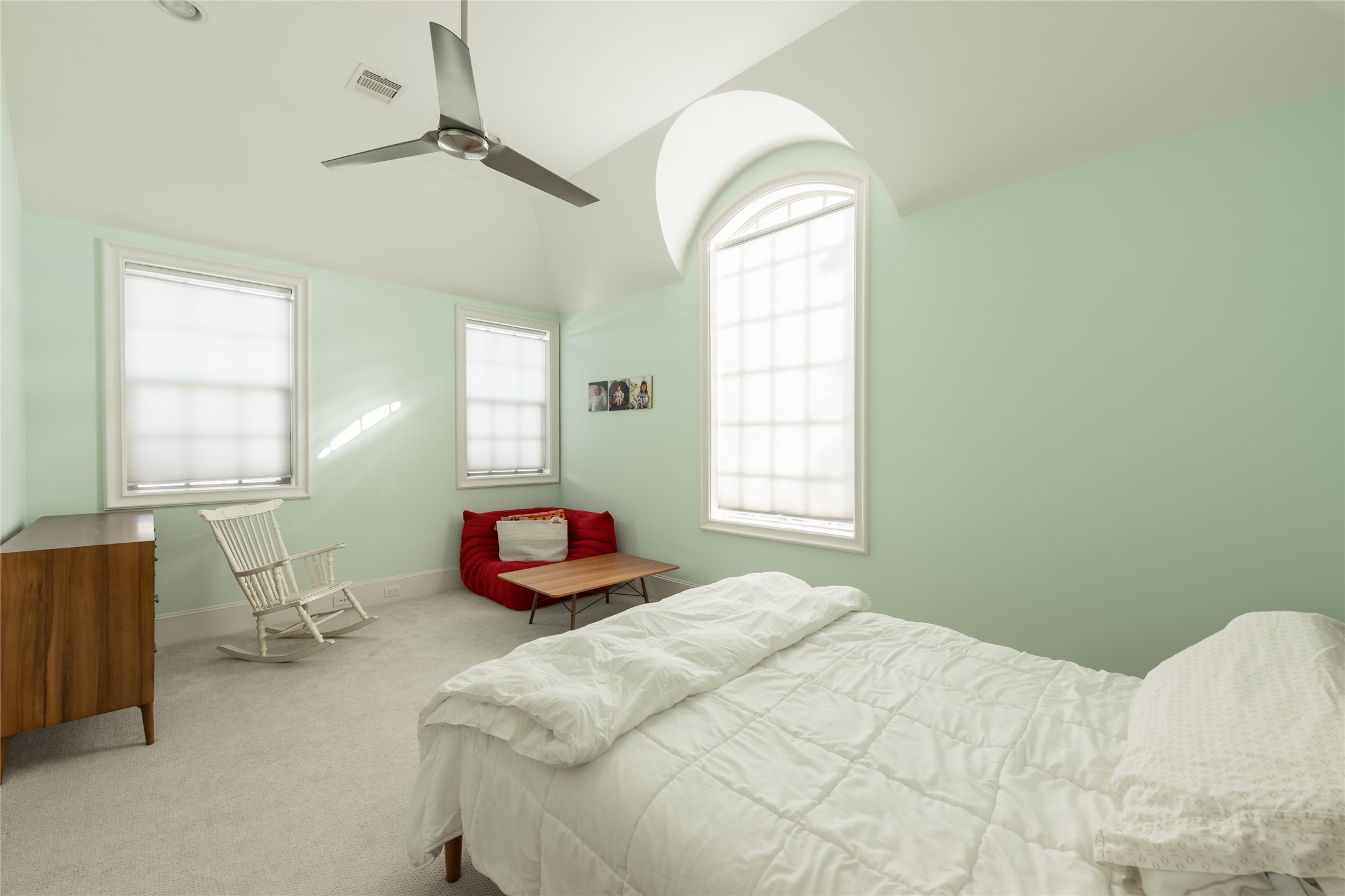 1944 Portsmouth Street Houston, TX 77098 - Photo 29 of 36 a bedroom with a bed and window