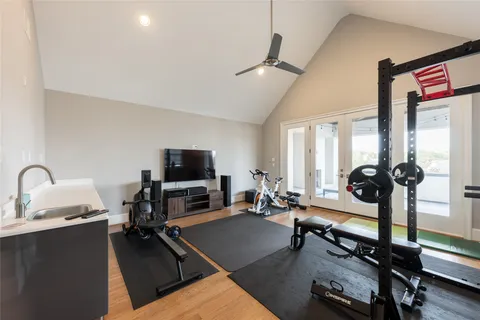 a view of a livingroom with workspace and a window