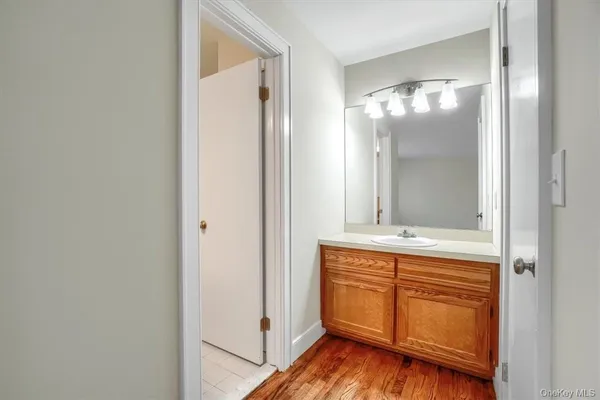a view of a bathroom from a hallway