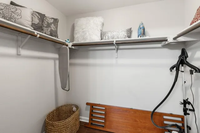 a room with a desk and a window