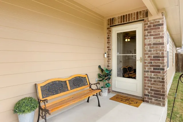 a bench sitting in front of a building