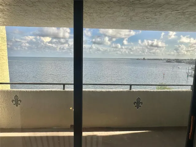 a room with furniture and a flat screen tv