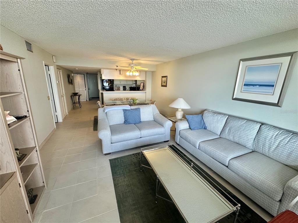 6035 Sea Ranch Drive, Unit 508 Hudson, FL 34667 - Photo 15 of 69 a living room with furniture and a couch