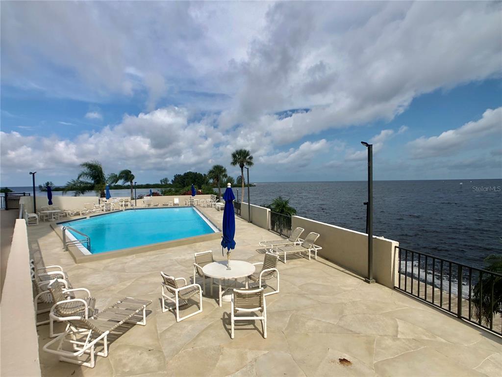 6035 Sea Ranch Drive, Unit 508 Hudson, FL 34667 - Photo 47 of 69 a view of swimming pool with seating space